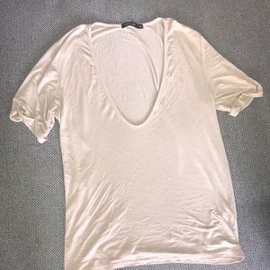 Tan colored V neck Tee shirt from Nasty Gal